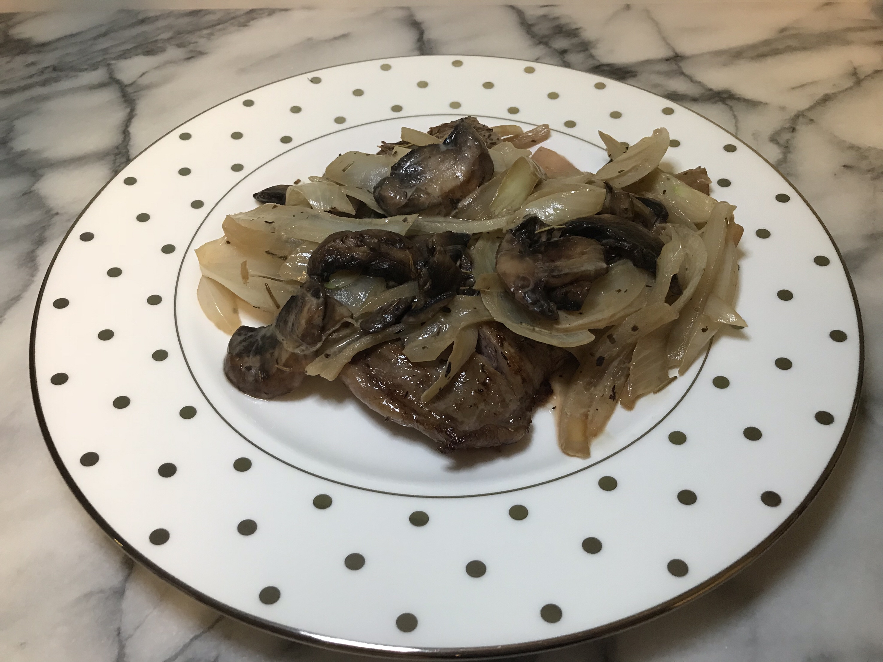 Rosemary-Thyme Flank Steak with Puck Cream Smothered Onions & Baby Bella Mushrooms