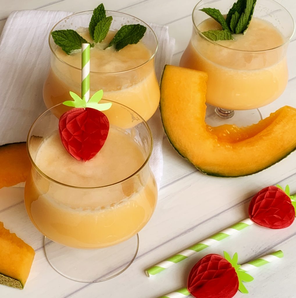 How to Make Agua Fresca, an authentic recipe featured by top US food blog, Food Diary of a City Girl: image of three glasses with agua fresca de melon garnished with mint