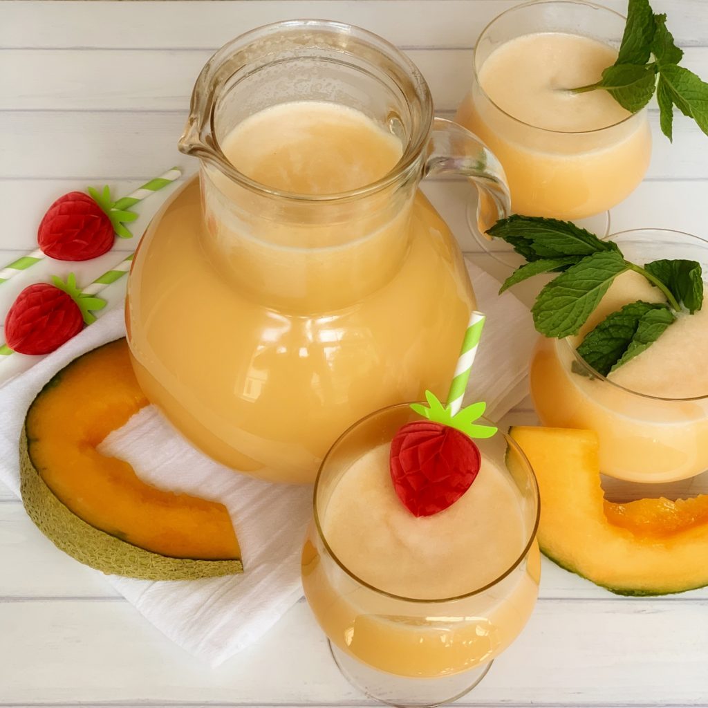 How to Make Agua Fresca, an authentic recipe featured by top US food blog, Food Diary of a City Girl: image of a pitcher and three glasses with agua fresca de melon