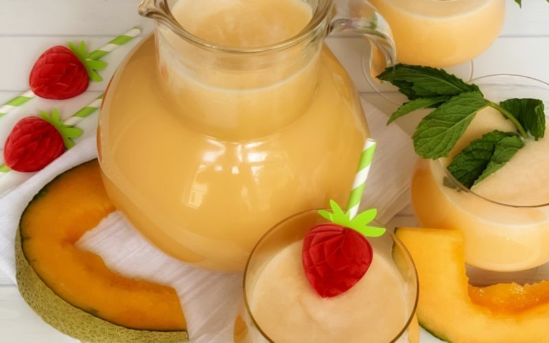 How to Make Agua Fresca, an authentic recipe featured by top US food blog, Food Diary of a City Girl: image of a jug and glass with agua fresca de melon