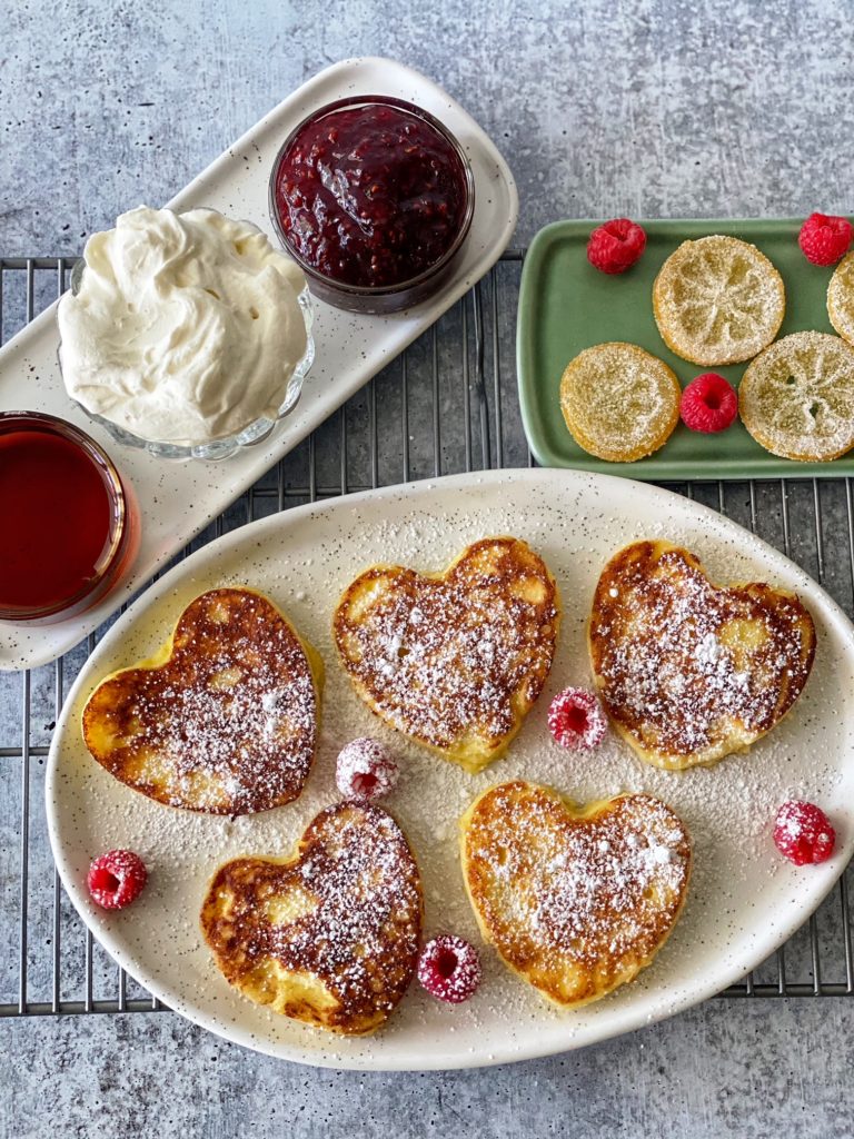 Lemon Ricotta Pancakes Recipe, perfect for Valentine's Day Breakfast, featured by top US food blogger, Food Diary of a City Girl.