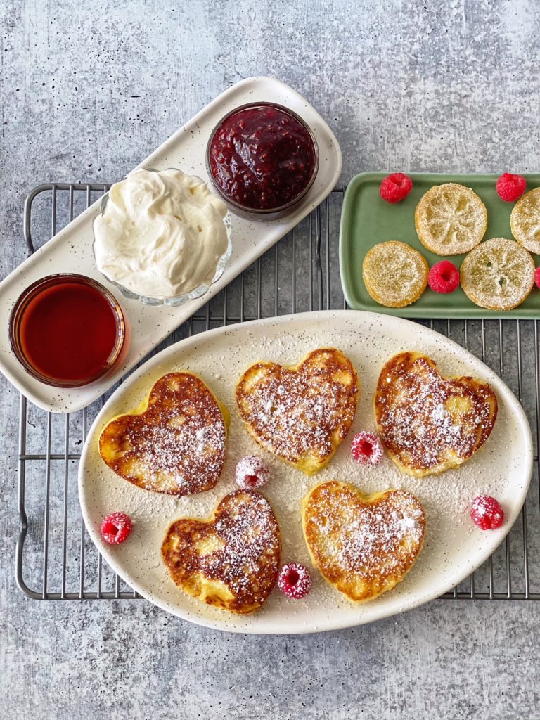 Lemon Ricotta Pancakes Recipe, perfect for Valentine's Day Breakfast, featured by top US food blogger, Food Diary of a City Girl.