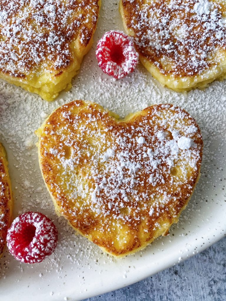 Lemon Ricotta Pancakes Recipe, perfect for Valentine's Day Breakfast, featured by top US food blogger, Food Diary of a City Girl.