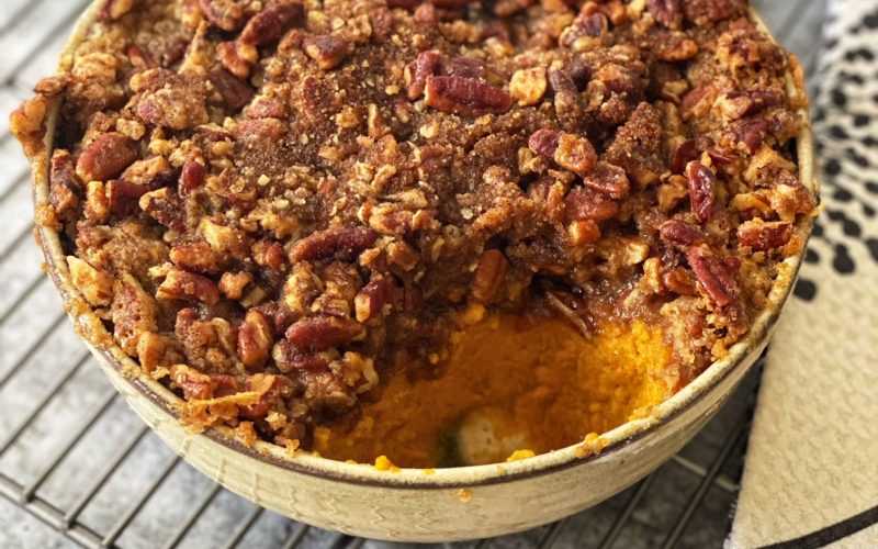 Sweet Potato Casserole with Pecans Topping featured by top US food blog, Food Diary of a City Girl: image of Sweet Potato Casserole served on North Carolina's HAAND Pottery.