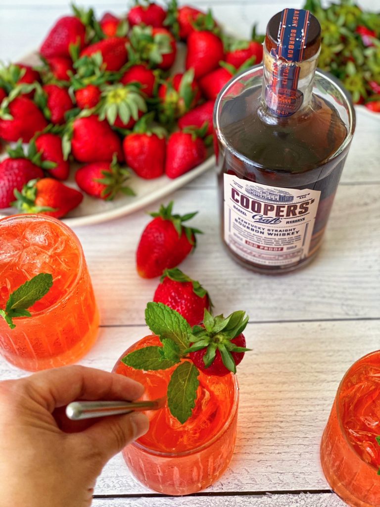 Strawberry Bourbon Cocktail, a fruity cocktail recipe featured by top US cocktail blogger Food Diary of a City Girl