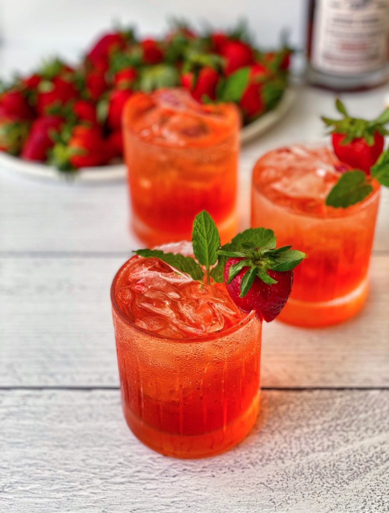 Strawberry Bourbon Cocktail, a fruity cocktail recipe featured by top US cocktail blogger Food Diary of a City Girl