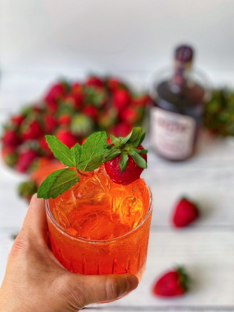 Strawberry Bourbon Cocktail, a fruity cocktail recipe featured by top US cocktail blogger Food Diary of a City Girl