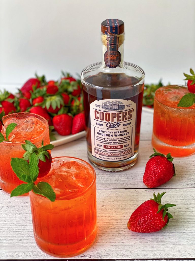 Strawberry Bourbon Cocktail, a fruity cocktail recipe featured by top US cocktail blogger Food Diary of a City Girl