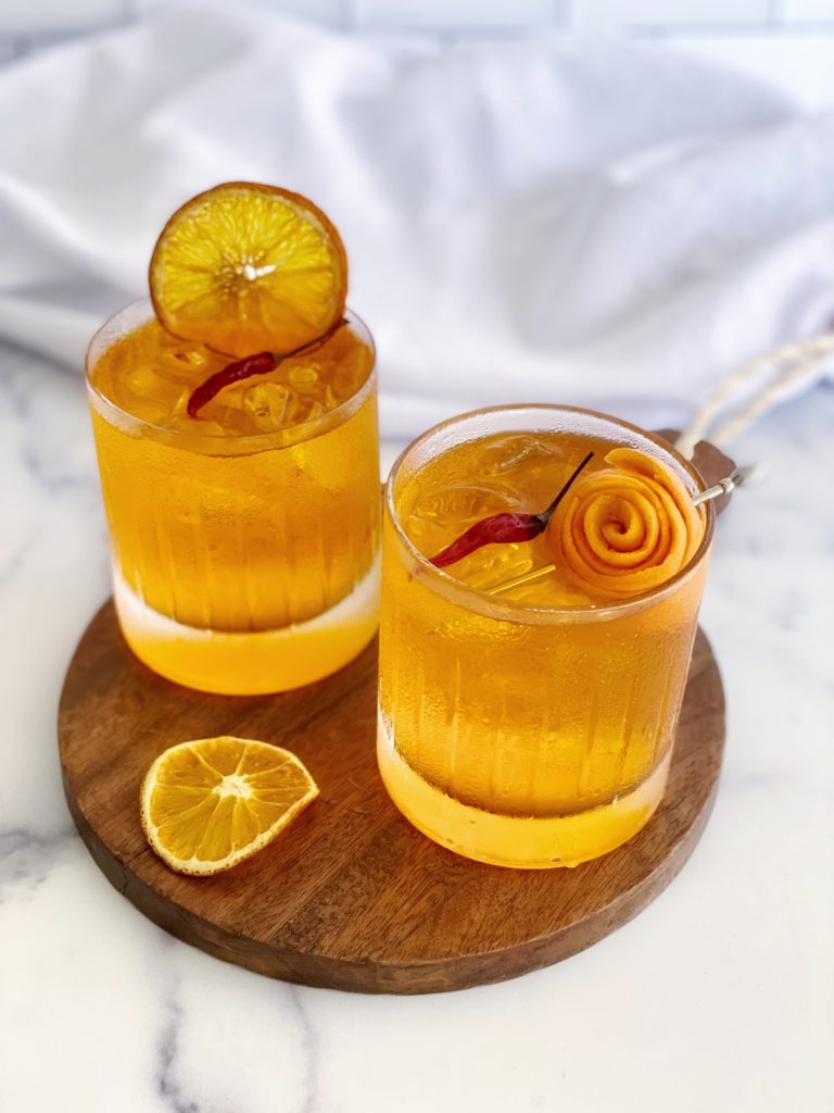 Spicy Aperol Paloma Cocktail Recipe featured by top US cocktail blogger, Food Diary of a City Girl