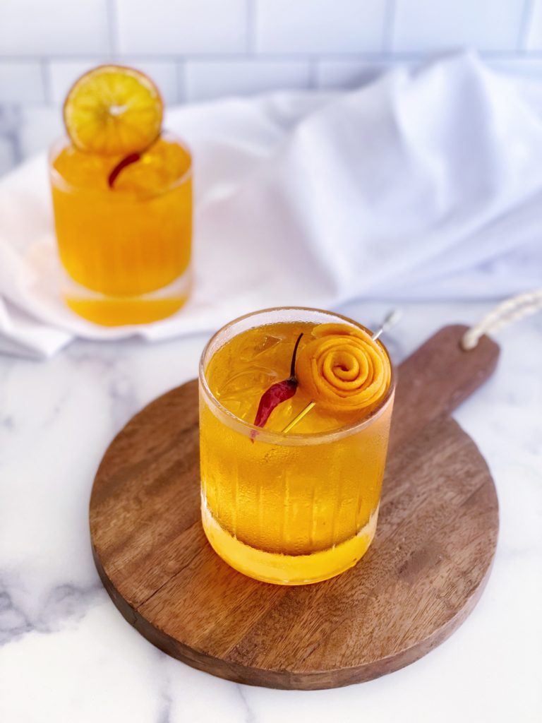 Spicy Aperol Paloma Cocktail Recipe featured by top US cocktail blogger, Food Diary of a City Girl