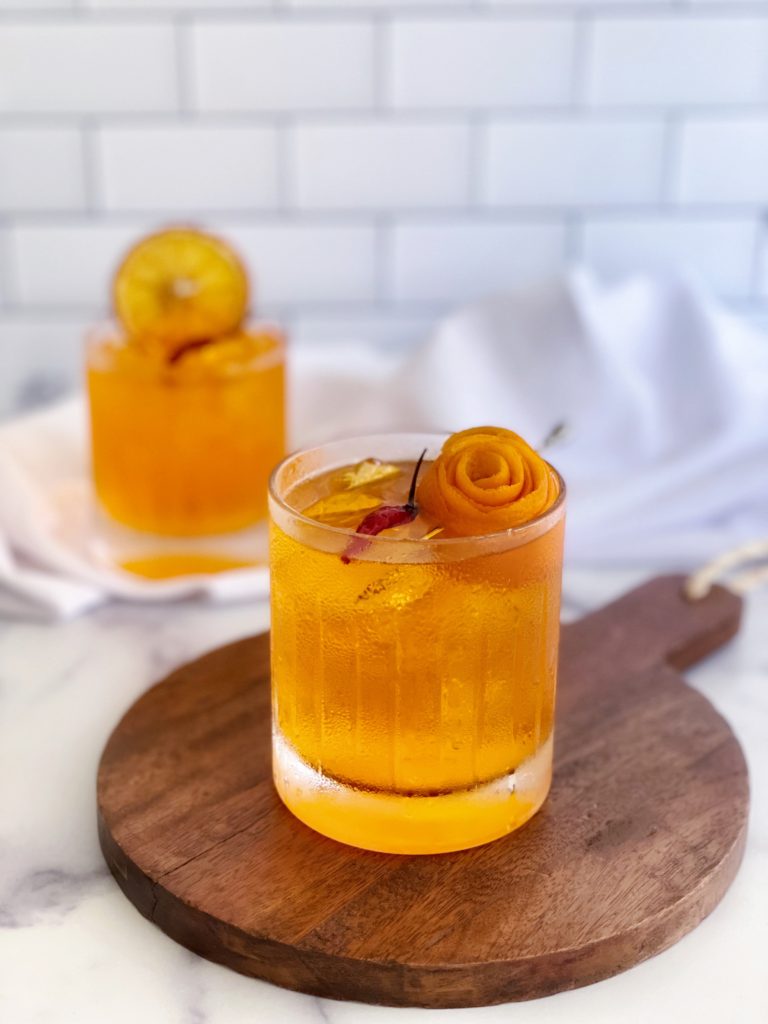 Spicy Aperol Paloma Cocktail Recipe featured by top US cocktail blogger, Food Diary of a City Girl